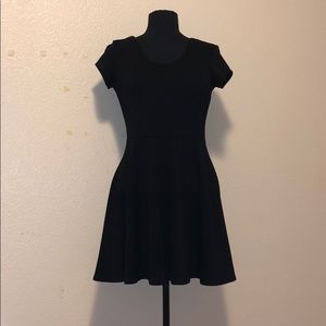 black skater skirt dress with roses detailing